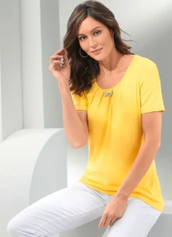 Feminines Shirt mit Zierelement
