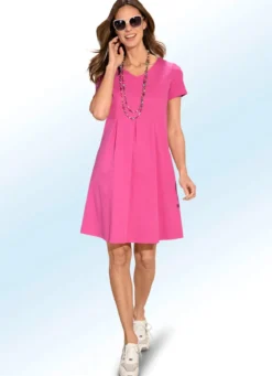 Kleid mit aufspringenden Kellerfalten