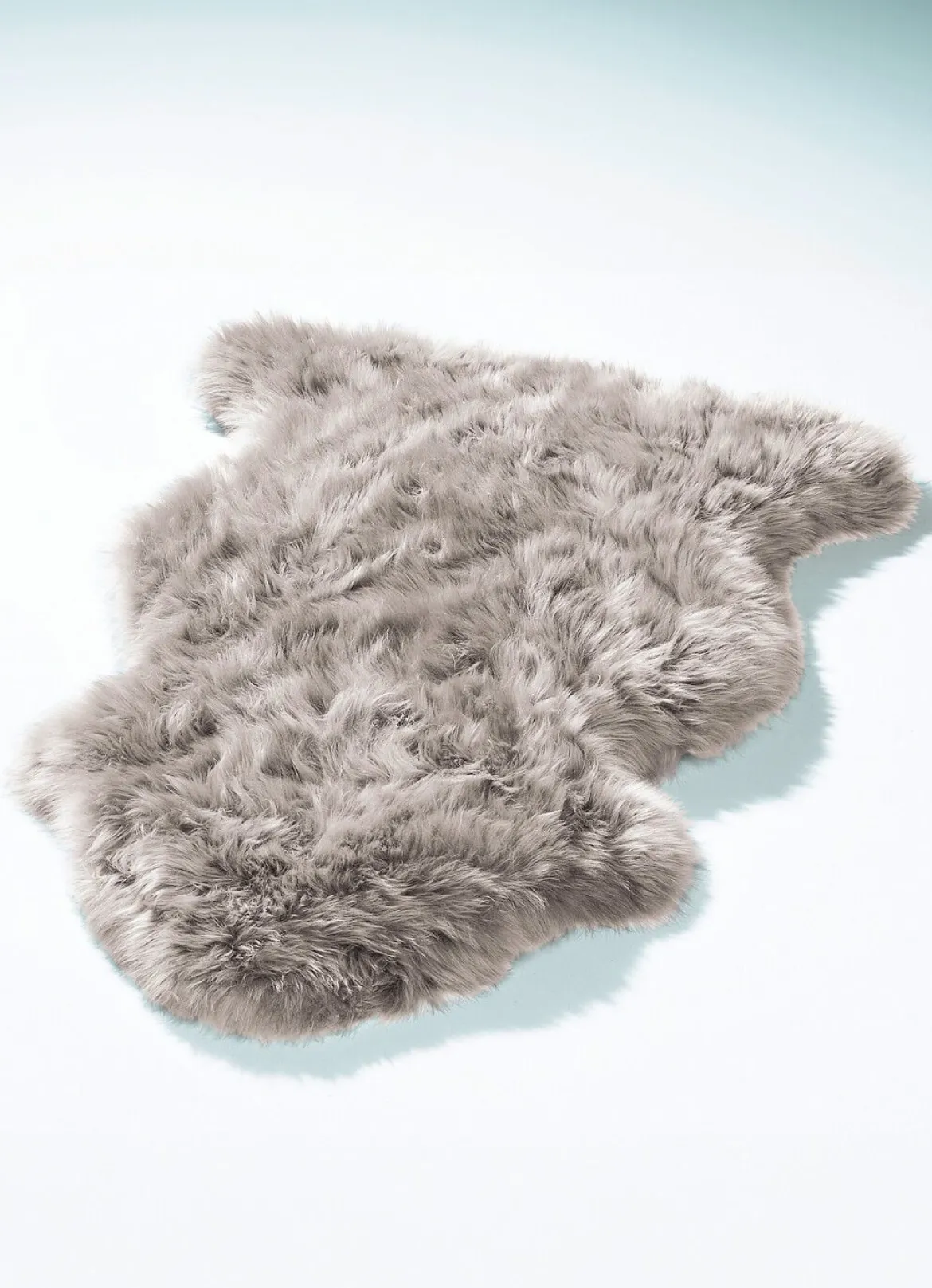 Vorleger aus echtem Lammfell in Tierform
